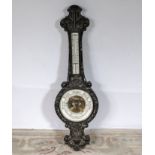 An antique aneroid barometer