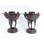 A pair of bronze censers