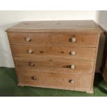 A Victorian pine chest of drawers two over three