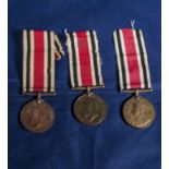 Three special constabulary long service medals. George V