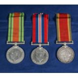 A trio of WW11 medals, Africa service and defence of war. K. R. Fowler