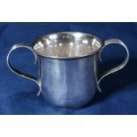 A two handled silver cup dated London 1901. 83gms 7cm tall