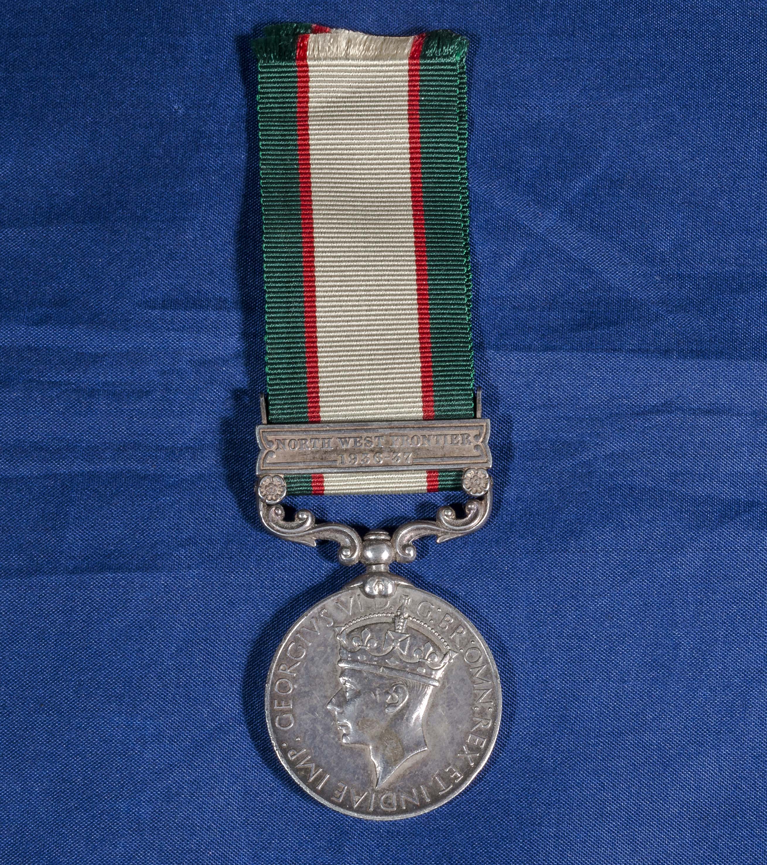 WW11 medal, North West Frontier 1936-37. 13330 Sepoy Dalip Singh, 12FFR