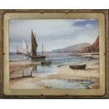 A small framed print of a coastal scene