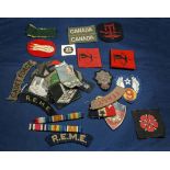 A collection of cloth badges