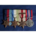 A group of four navy WW11 medals with Atlantic Africa bar 1942-43 and war medal