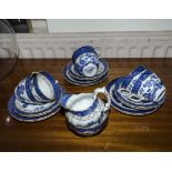 A willow pattern part tea set