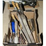 A box of carpenter's tools, chisels and files