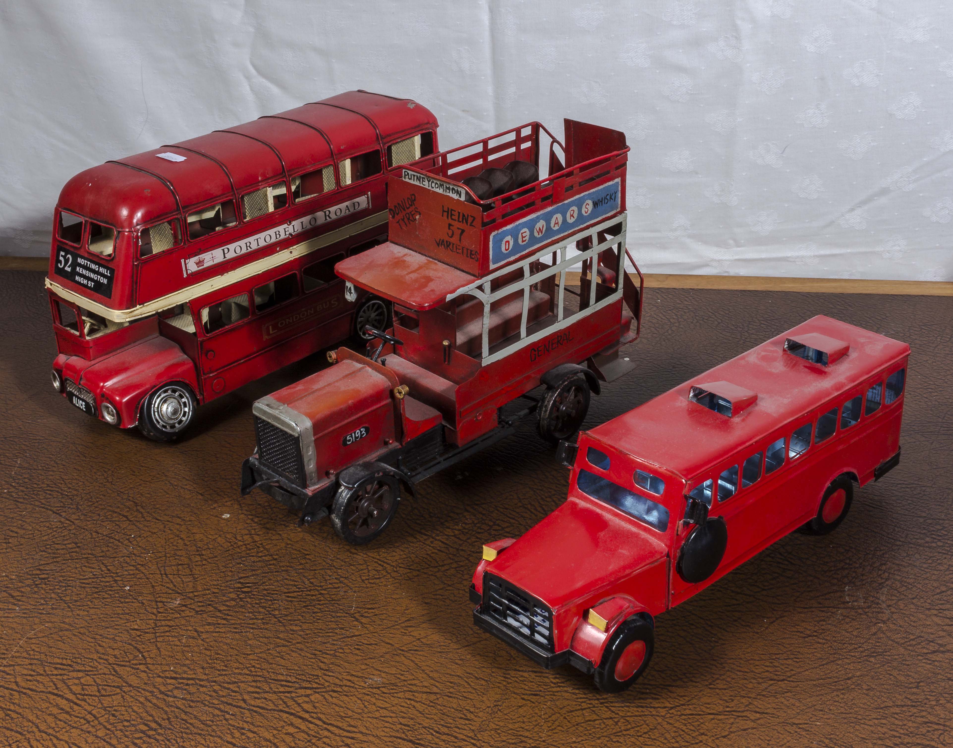 Three tin plate buses