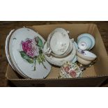 A box containing a part tea set and other porcelain items