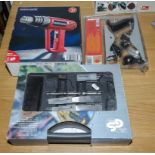 A Parkside heat gun, a wood plane set and a box of blades and drill bits