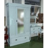 A painted single door wardrobe and a dressing table