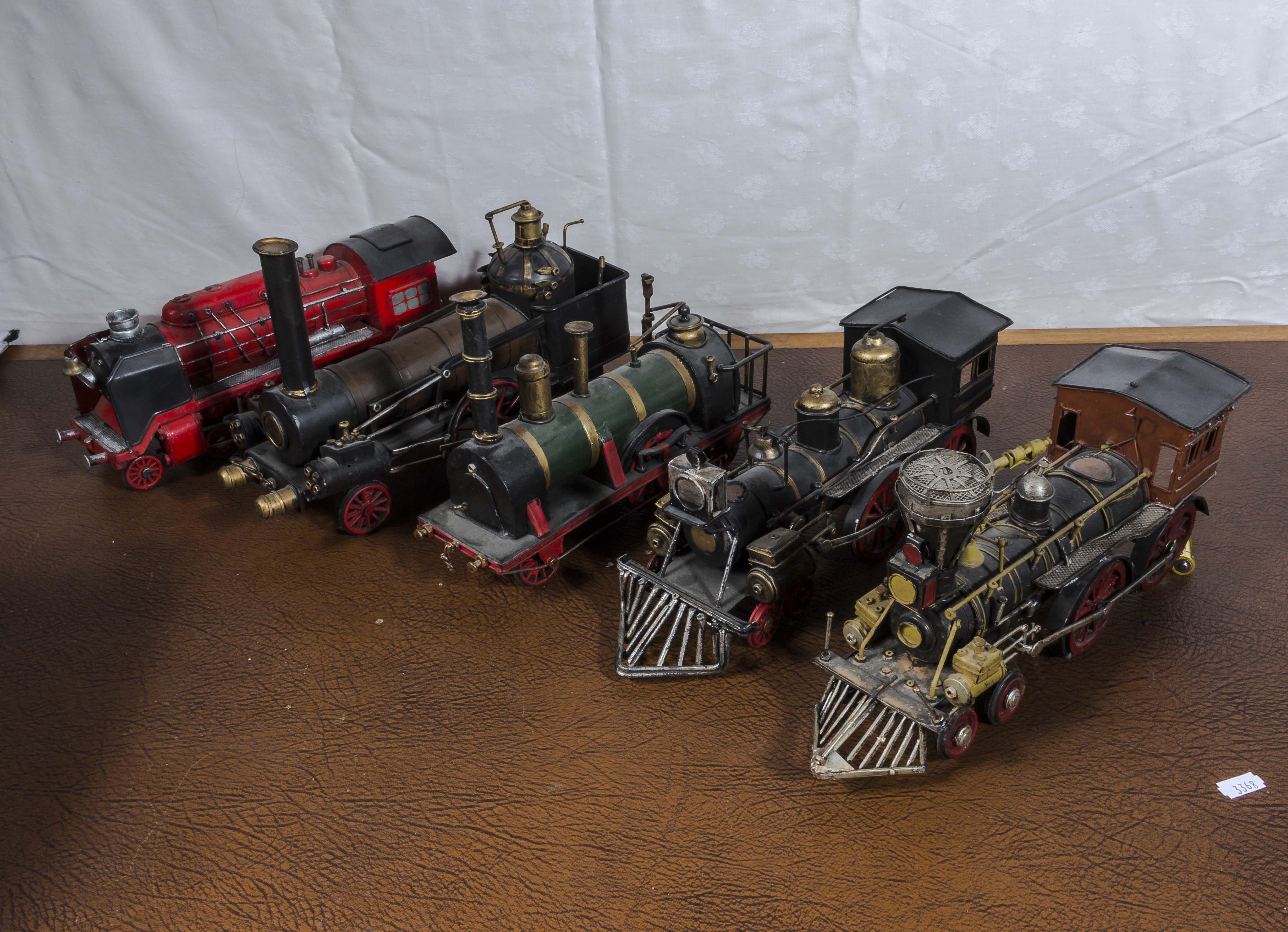 Five model tin plate train engines