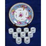 A set of nine Coalport porcelain napkin rings (boxed) together with a Coalport decorative plate