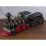 A model train containing Jim Beam Bourbon, opened