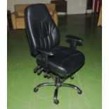 A black swivel office chair