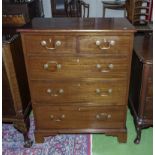 An Edwardian mahogany chest of two drawers over three