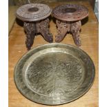 A brass charger and two small Anglo Indian tables