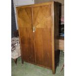 An oak 2 door robe.