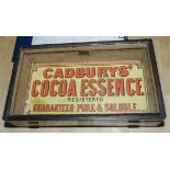 A small vintage glass display case advertising Cadburys Cocoa Essence 14" x 8" x 4"