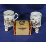 Two Commemorative mugs, a Tartan Ware money box and two others