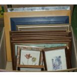 A box containing framed prints