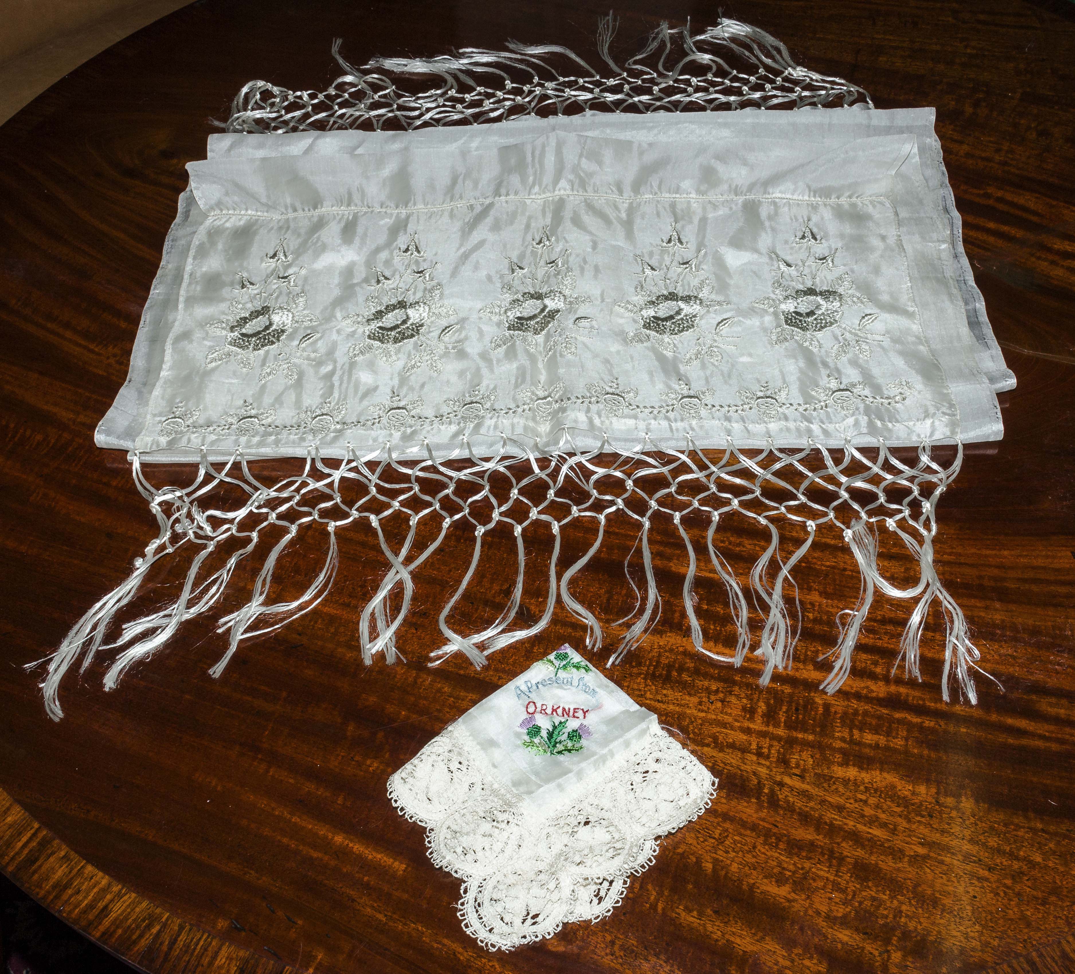 A Victorian silk shawl and embroidered handkerchief