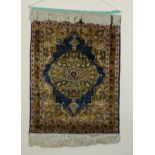 A small silk and wool prayer rug made in Kashmir, dating from 1947 in perfect condition. Silk face