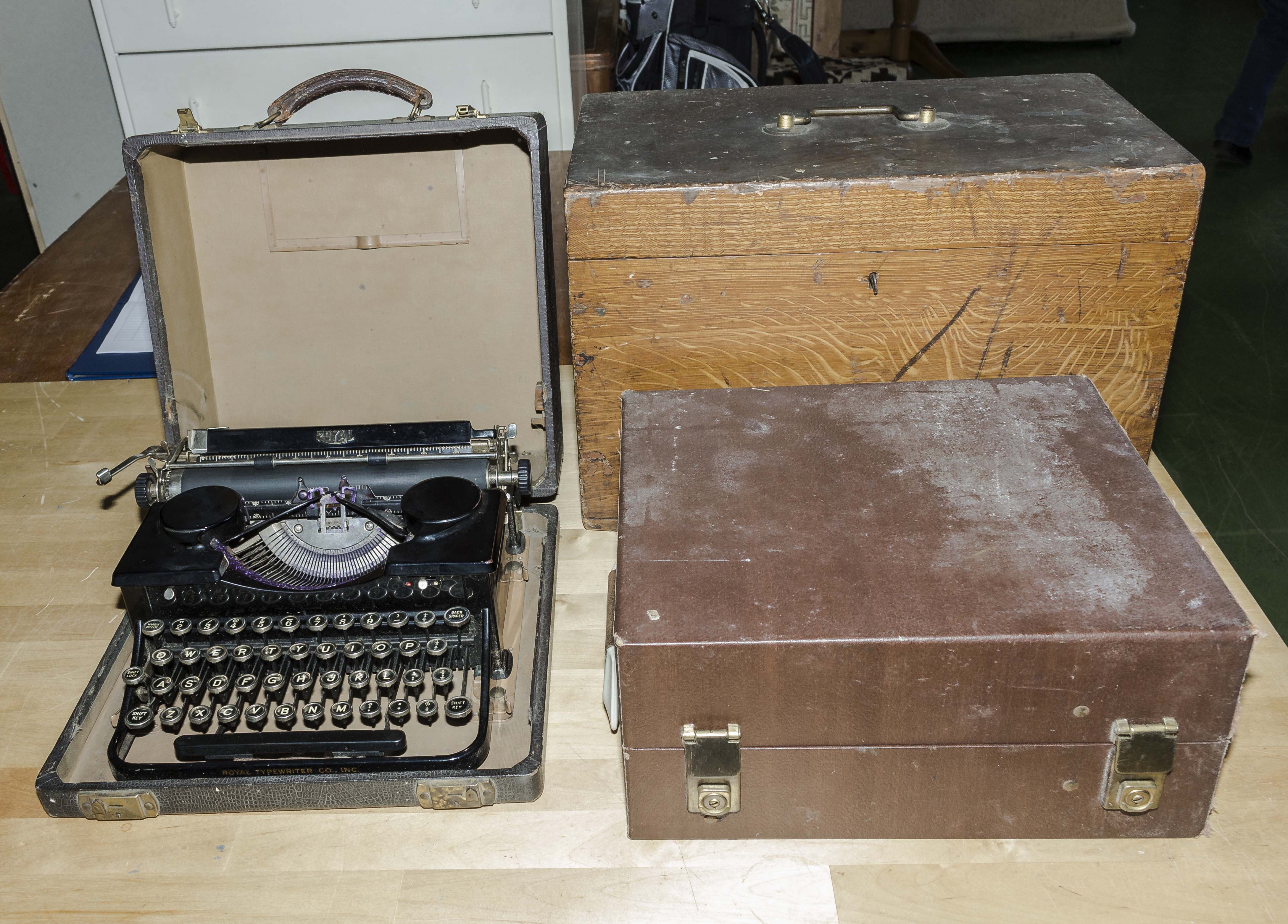 A pine box, vintage typewriter and one other