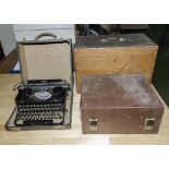 A pine box, vintage typewriter and one other