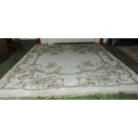 A large white ground wool carpet