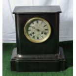 A small slate clock.