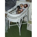 A Moses basket together with soft toys