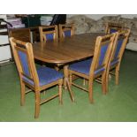 A pine table and 6 chairs