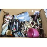 A box containing assorted pottery items