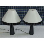 A pair of retro style table lamps and shades