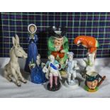 A collection of assorted pottery figures