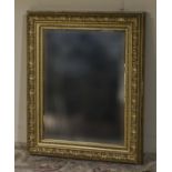 A gilt framed wall mirror 74cm x 61cm