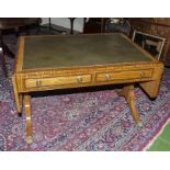 A very good quality Edwardian satinwood cross banded sofa table with leather panel to top and