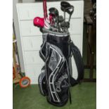 Golf bag and clubs.