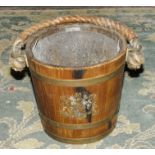 A wooden powder bucket made from battleships of Britain, worn label inside with indistinct