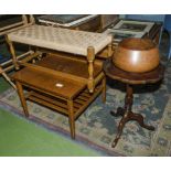 2 stools a wine table and a wood bowl.