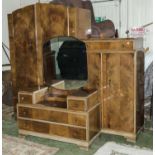 A 1930s walnut bedroom set.