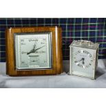 A retro mantle clock and a carriage clock