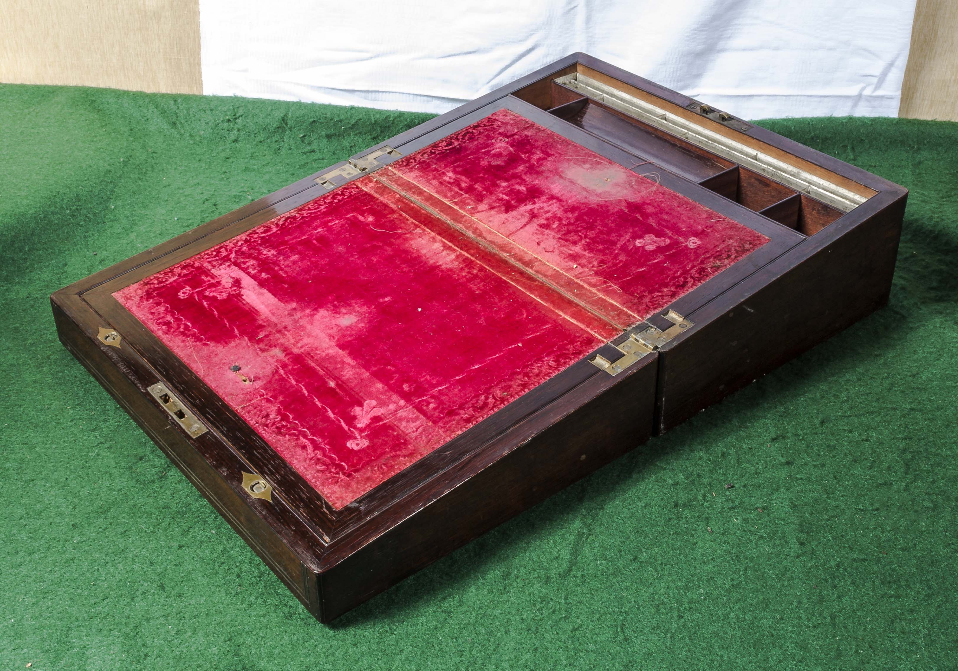 A Victorian rosewood writing box.