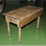 A Victorian pine table.