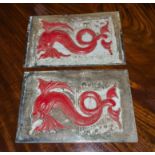 A pair of Arts and Crafts metal fish panels