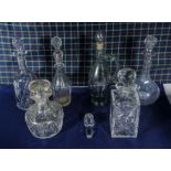 Six assorted glass decanters