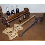 A book trough, chestnut roaster, carpet beater and vintage beer