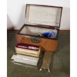 A mahogany box containing vintage dominoes and two cribbage boards